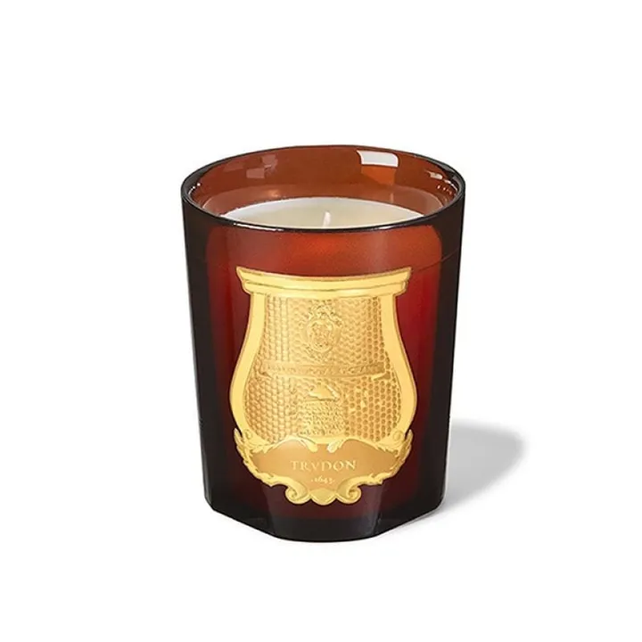 Bougie Trudon dans son verre ambré orné d'un écusson doré
